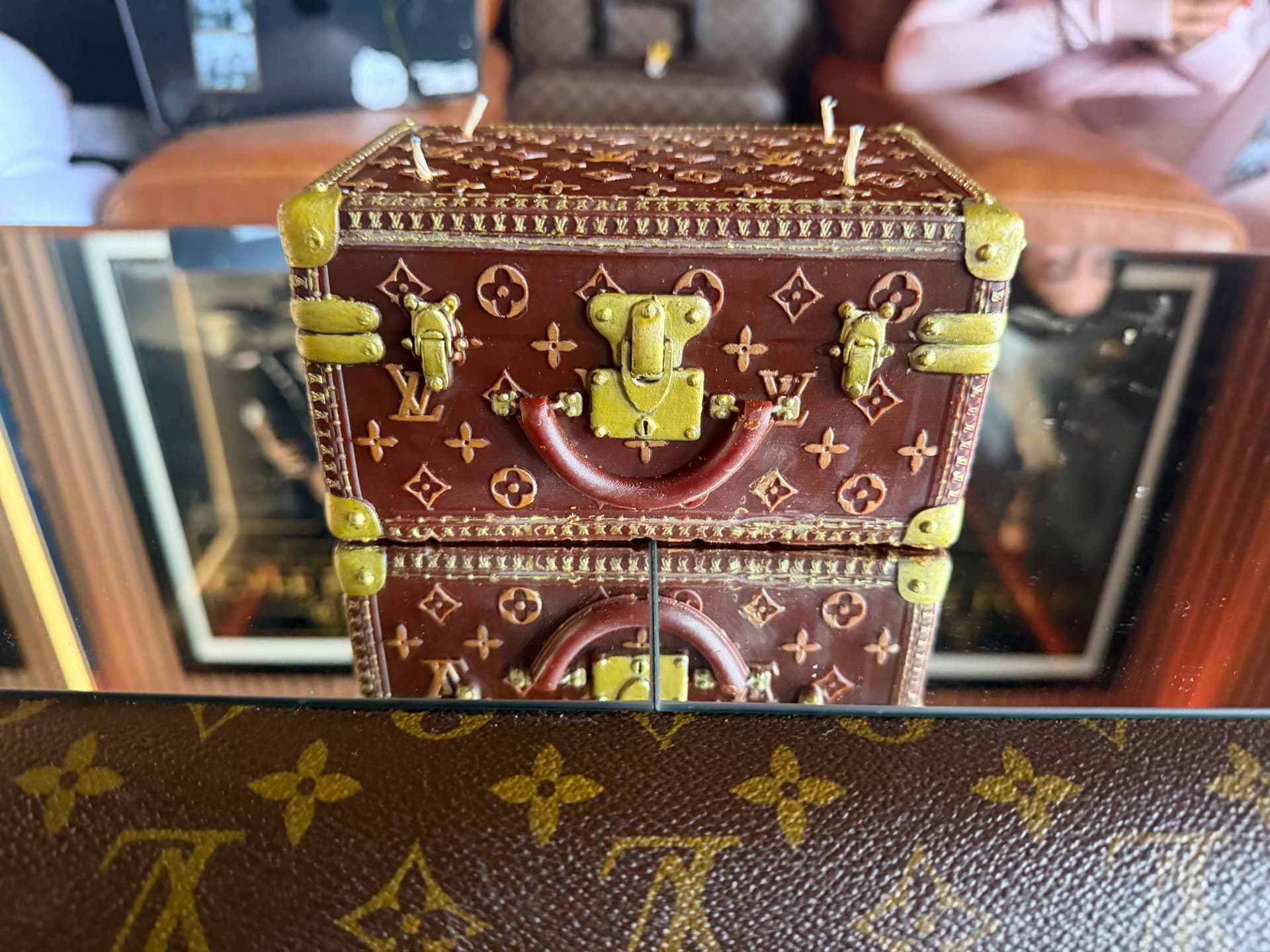 Handmade trunk candle at Café Louis
